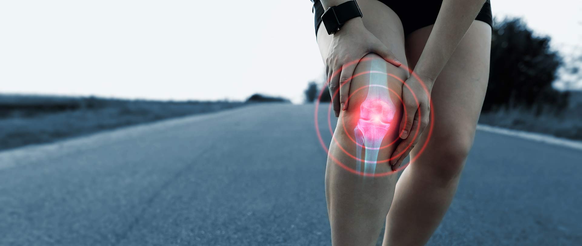 Photo of runner in knee pain